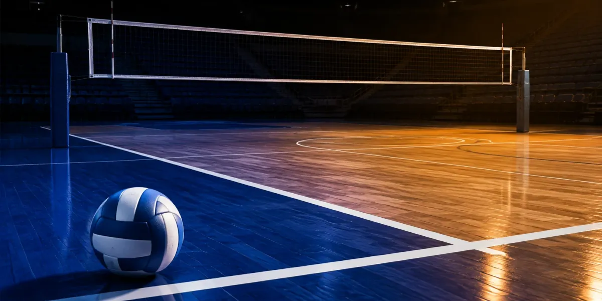 Original editorial illustration of one blue-and-white volleyball on an empty indoor court beneath a net after a night match.