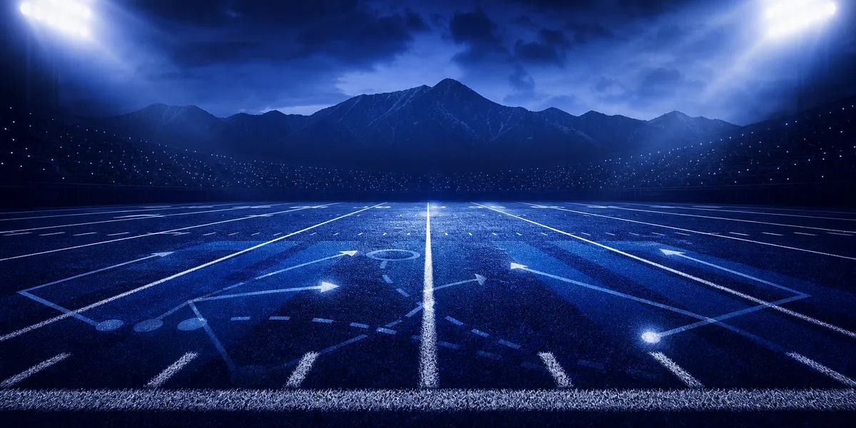 Abstract navy football trench graphic with defensive line gaps and mountain shapes, created for BYU Sport Nuts.